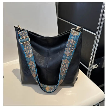 Vera™ – Leveäolkain vintage-kassilaukku